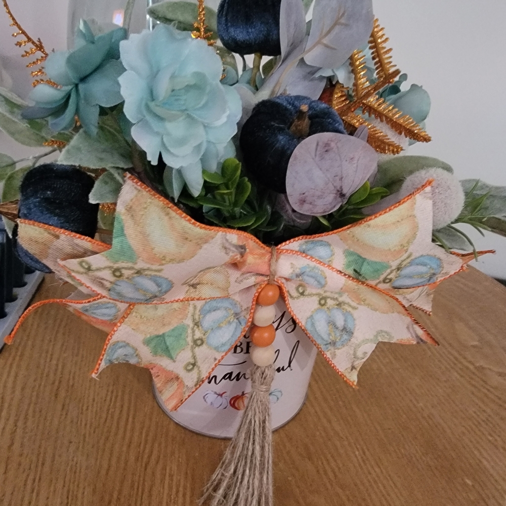 Floral Arrangement with Black and Blue Accents